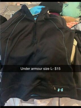 Under Armour Women’s Black Half-Zip Pullover with Light Blue Accents